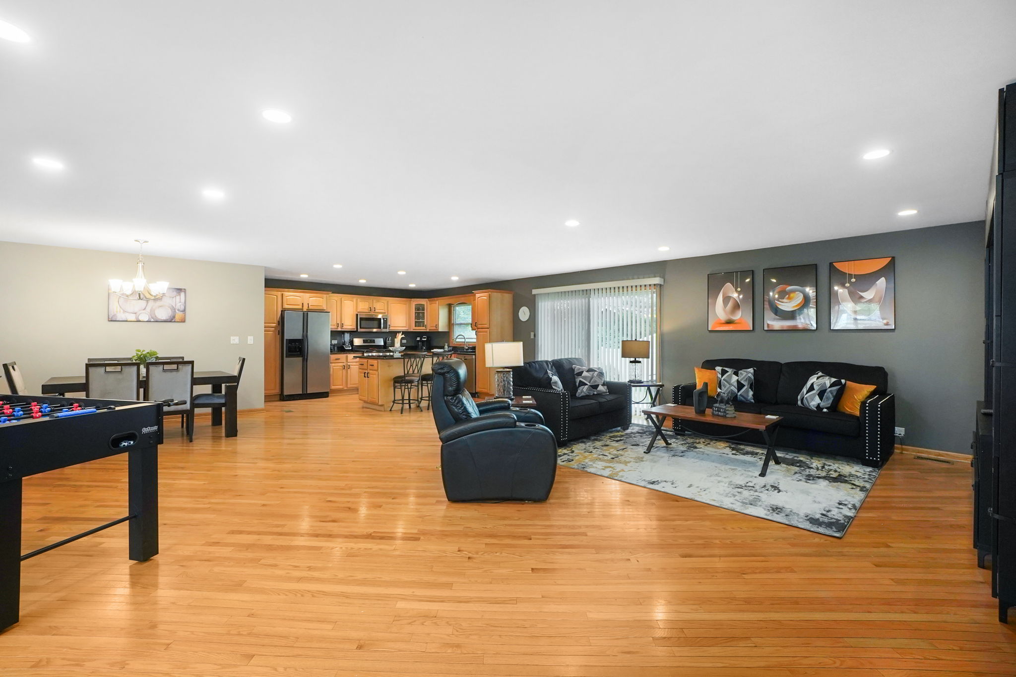 Living and kitchen areas of a house rental. Find furnished homes in Chicago.